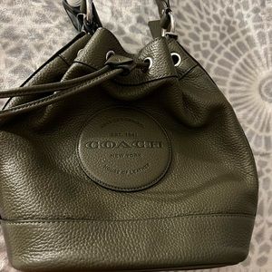 Used Coach bucket bag, beautiful and still has plenty of life in it!